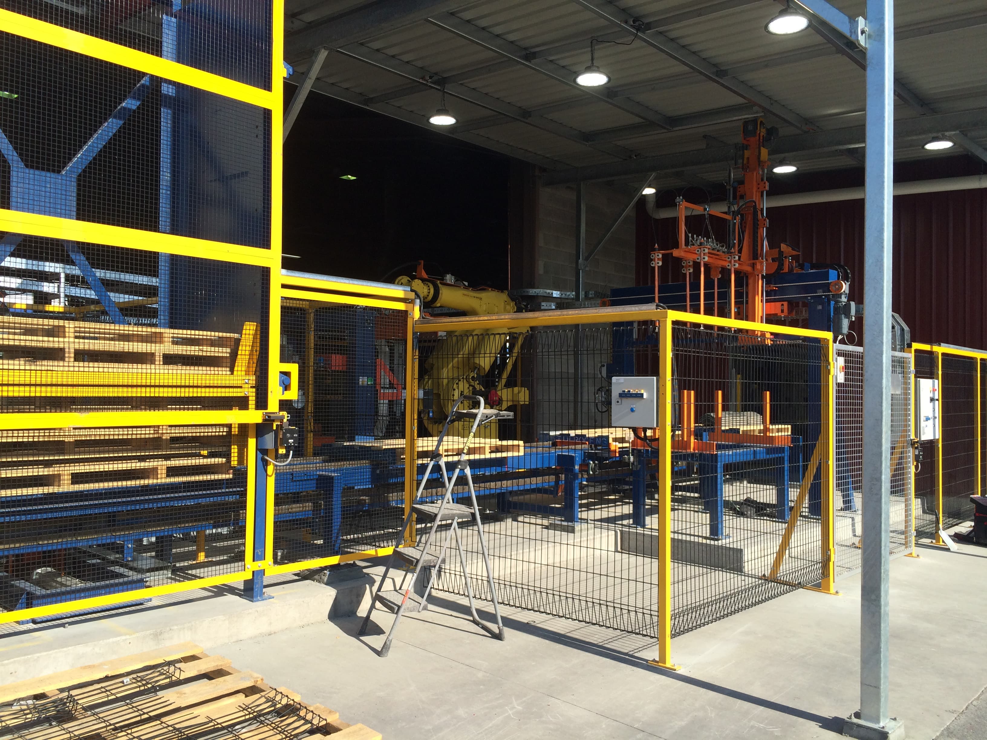 Engineers commissioning industrial automation equipment on site
