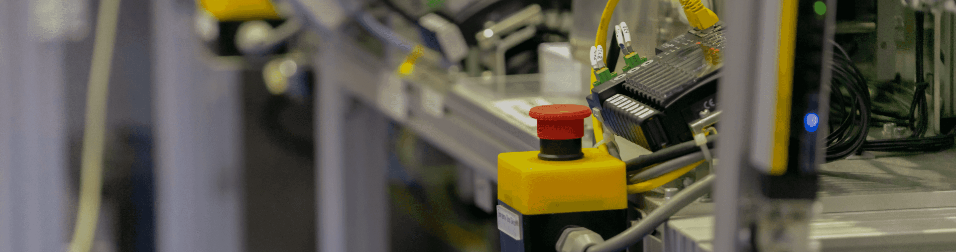 Functional safety hardware and emergency stop equipment in an industrial system