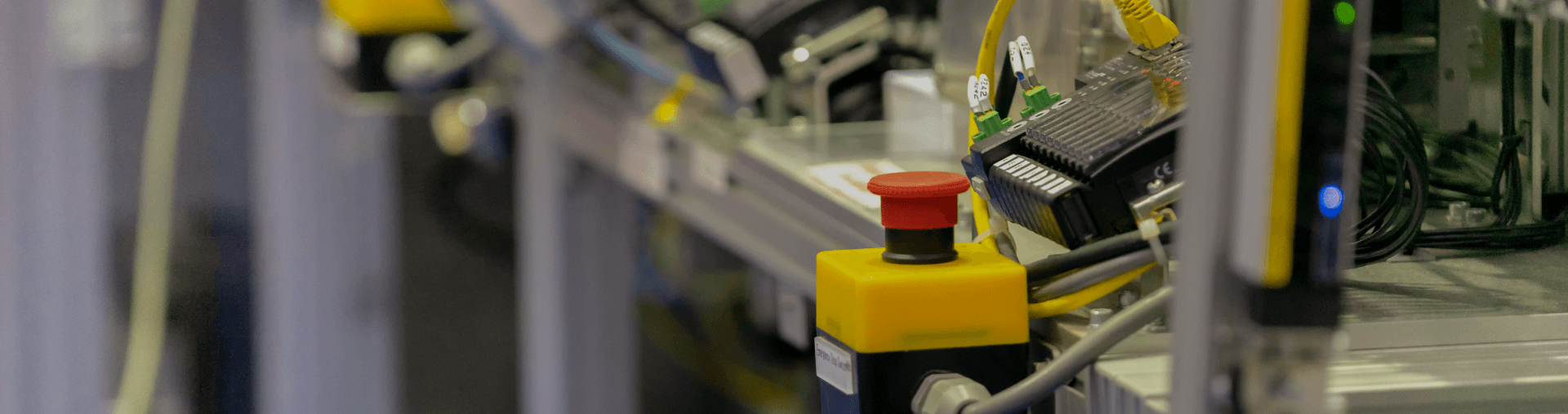 Functional safety hardware and emergency stop equipment in an industrial system