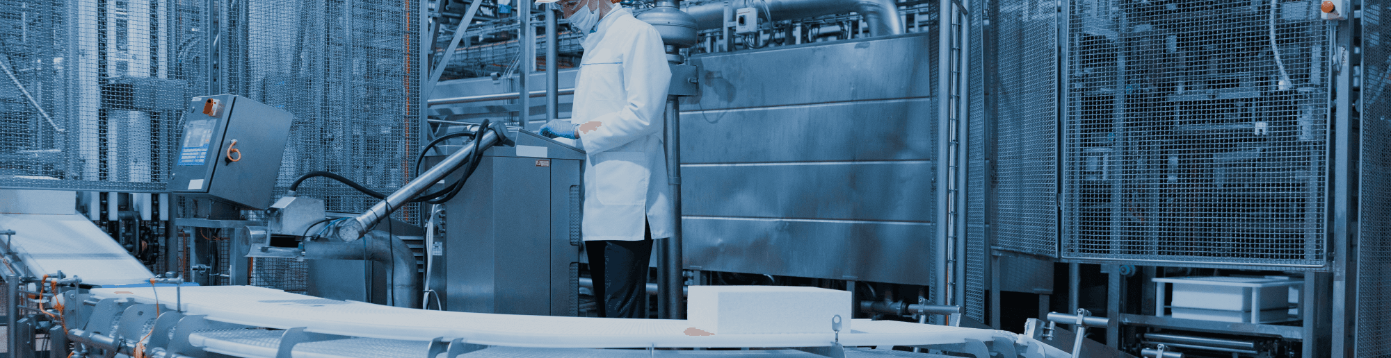 Automation support and maintenance engineers working on industrial control systems